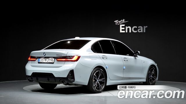 BMW 3-Series G20 320i M Sport - фото 1