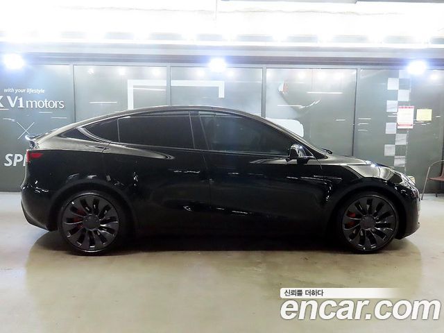 Tesla Model Y Performance AWD - фото 2