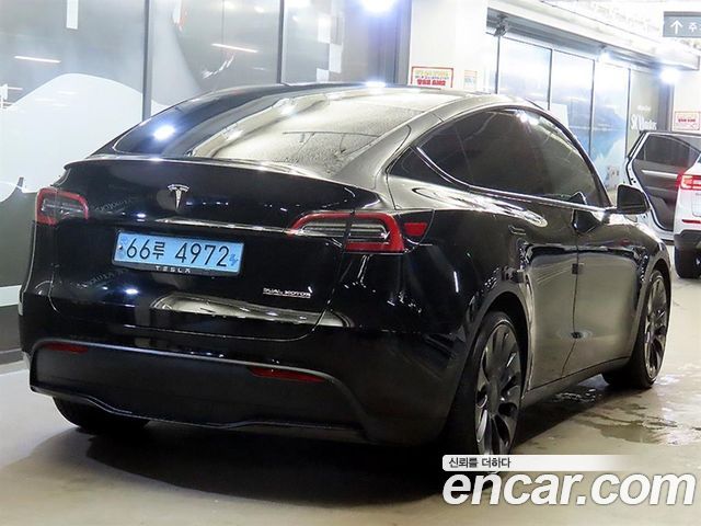 Tesla Model Y Performance AWD - фото 3
