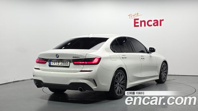 BMW 3-Series G20 320i M Sport - фото 1