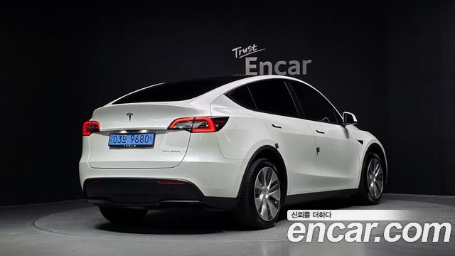 Tesla Model Y Long Range AWD - фото 1