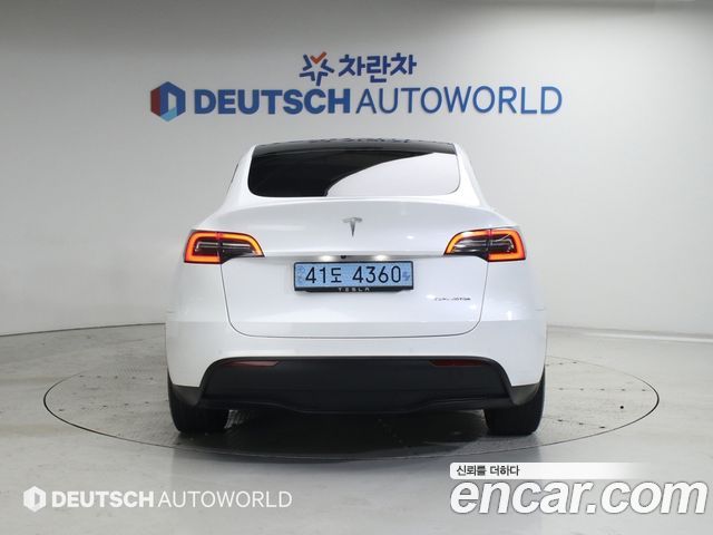 Tesla Model Y Long Range AWD - фото 4