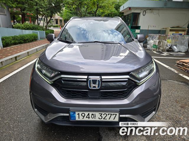 Honda CR-V 5-го поколения 2.0 Hybrid Touring 4WD - фото 0