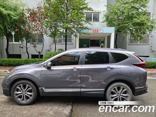 Honda CR-V 5-го поколения 2.0 Hybrid Touring 4WD - фото 1