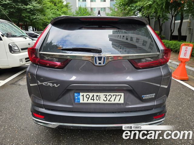 Honda CR-V 5-го поколения 2.0 Hybrid Touring 4WD - фото 2
