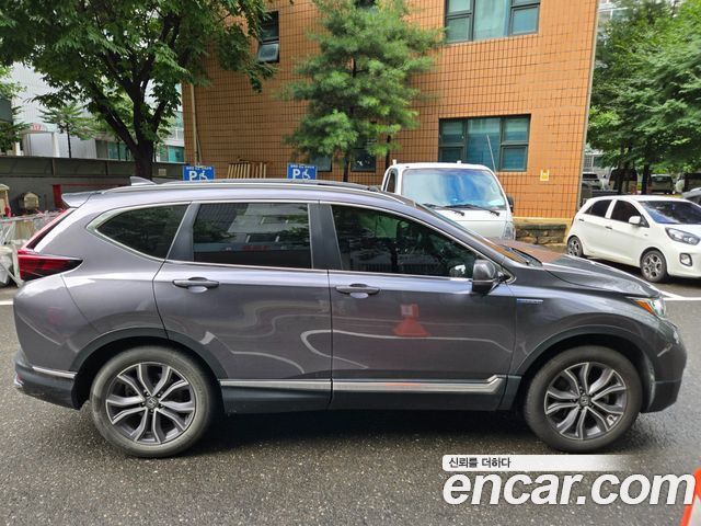 Honda CR-V 5-го поколения 2.0 Hybrid Touring 4WD - фото 3