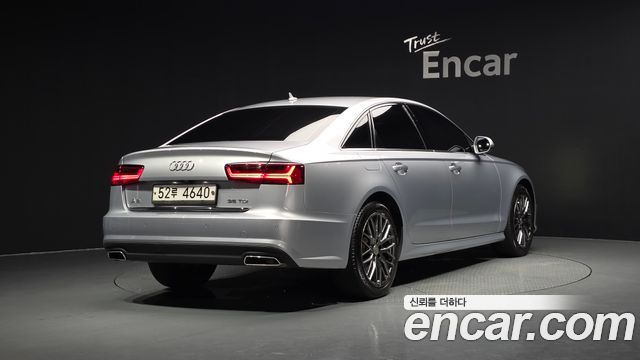 Audi A6 35 TDI Premium C7 - фото 1