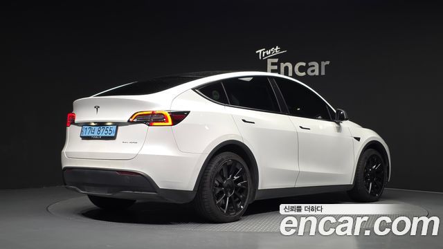 Tesla Model Y Long Range AWD - фото 1