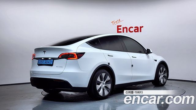 Tesla Model Y Long Range AWD - фото 1
