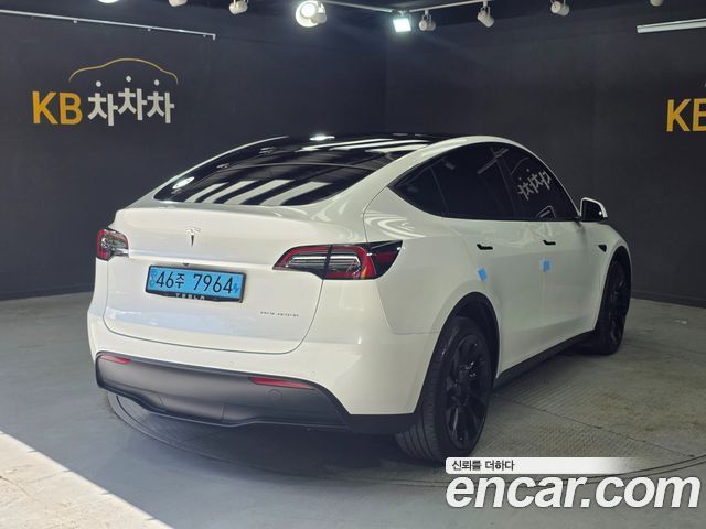 Tesla Model Y Long Range AWD - фото 1