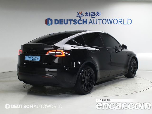 Tesla Model Y Long Range AWD - фото 3