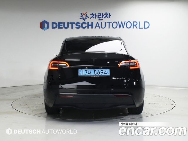 Tesla Model Y Long Range AWD - фото 4