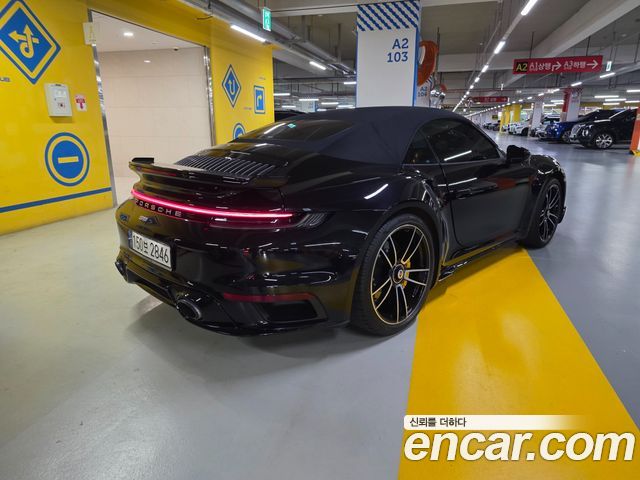 Porsche 911 Turbo S Cabriolet - фото 1