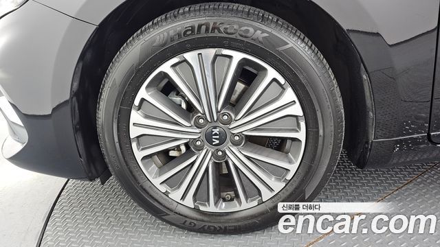 Kia K7 Premier, гибрид Signature - фото 4