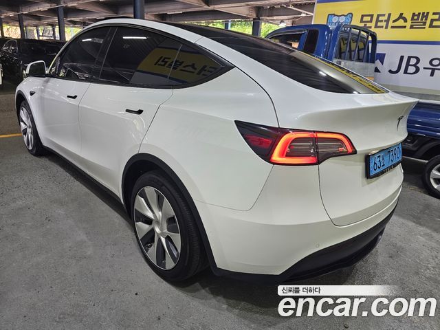Tesla Model Y Long Range AWD - фото 2