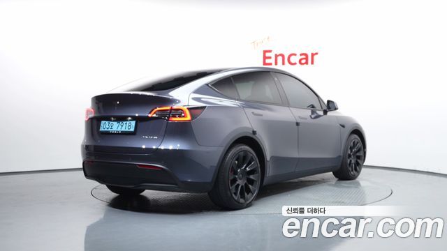 Tesla Model Y Long Range AWD - фото 1