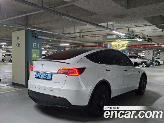 Tesla Model Y Long Range AWD - фото 3