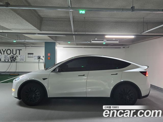 Tesla Model Y Long Range AWD - фото 4