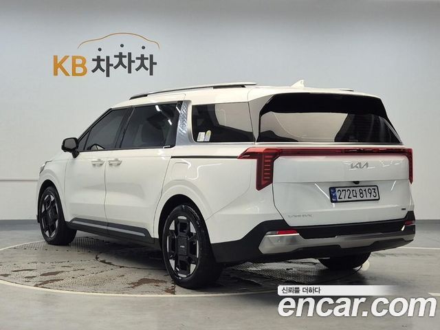 Kia Carnival New 4-го поколения HEV 9seater Signature - фото 1