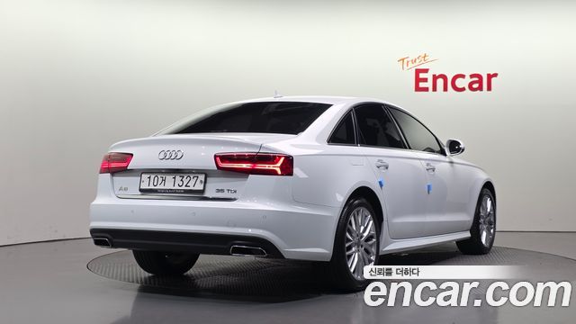 Audi A6 35 TDI Premium C7 - фото 1