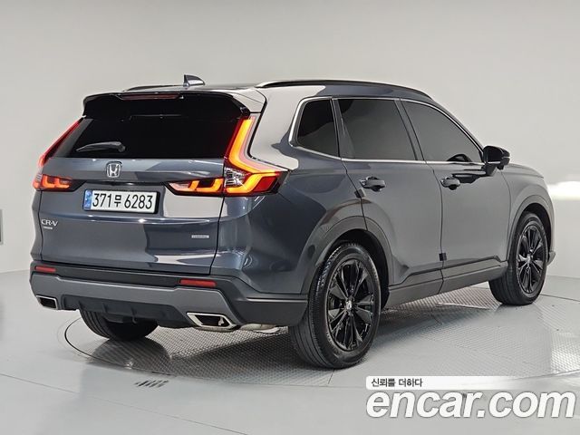 Honda CR-V 6-го поколения 2.0 Hybrid Touring 2WD - фото 3