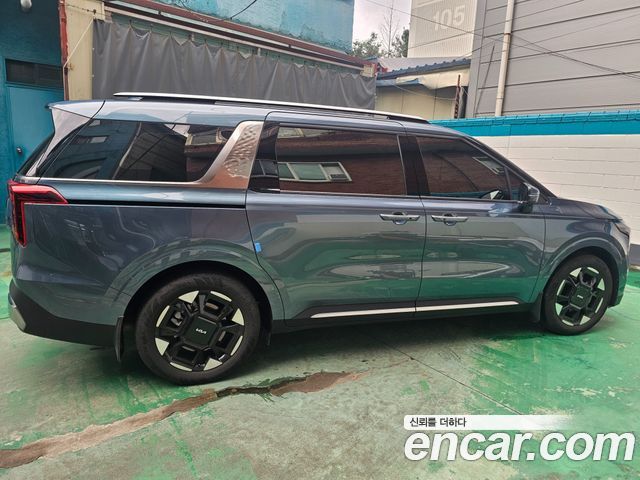 Kia Carnival New 4-го поколения HEV 9seater Signature - фото 1
