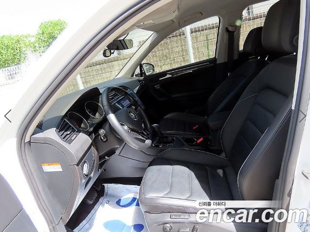 Volkswagen Tiguan 2-го поколения 2.0 TDI Premium - фото 4