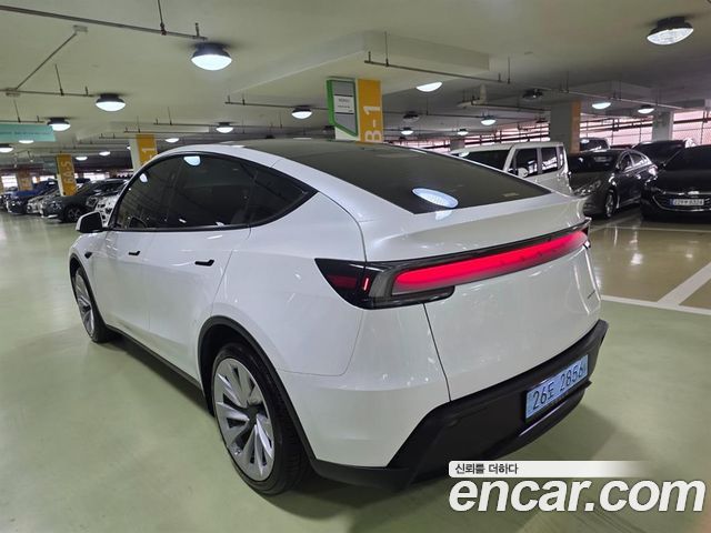 Tesla Model Y Long Range AWD - фото 1