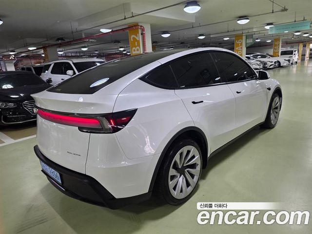 Tesla Model Y Long Range AWD - фото 2