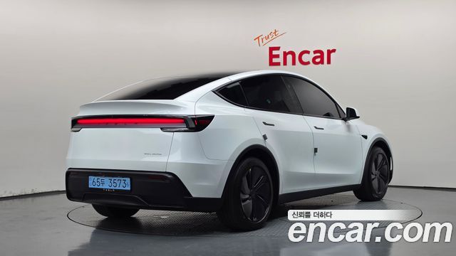 Tesla Model Y Long Range AWD - фото 1