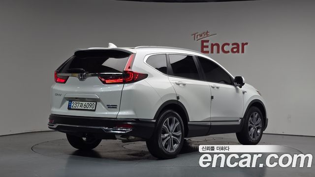 Honda CR-V 5-го поколения 2.0 Hybrid Touring 4WD - фото 0