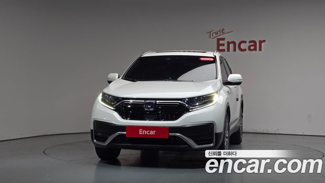 Honda CR-V 5-го поколения 2.0 Hybrid Touring 4WD - фото 1