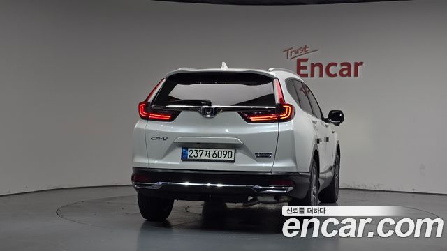 Honda CR-V 5-го поколения 2.0 Hybrid Touring 4WD - фото 2