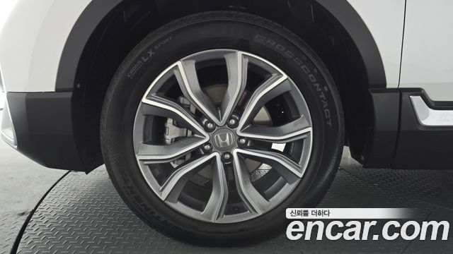 Honda CR-V 5-го поколения 2.0 Hybrid Touring 4WD - фото 3