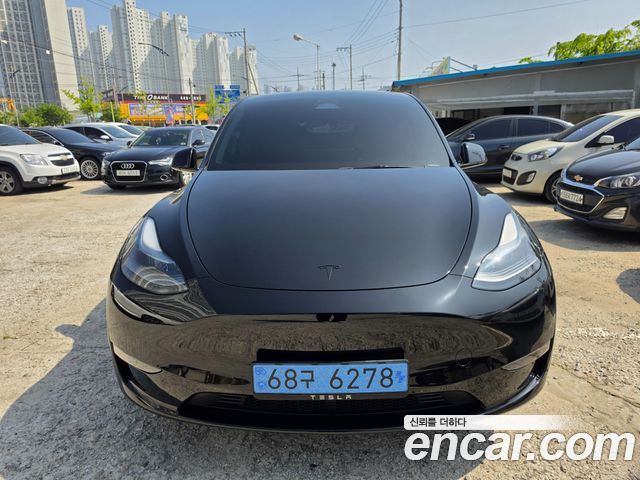 Tesla Model Y Long Range AWD - фото 1