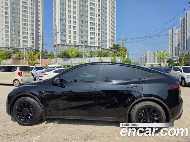 Tesla Model Y Long Range AWD - фото 2
