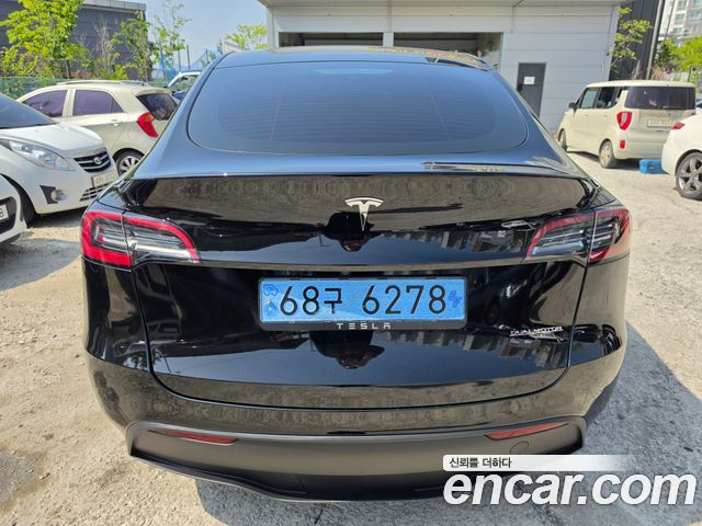 Tesla Model Y Long Range AWD - фото 4