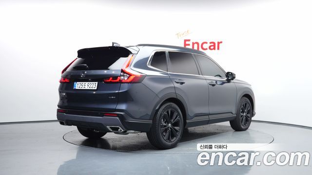 Honda CR-V 6-го поколения 2.0 Hybrid Touring 2WD - фото 1