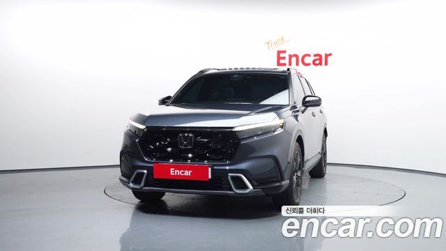 Honda CR-V 6-го поколения 2.0 Hybrid Touring 2WD - фото 2