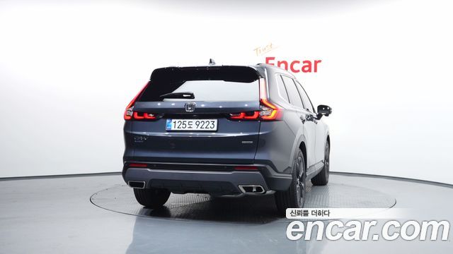 Honda CR-V 6-го поколения 2.0 Hybrid Touring 2WD - фото 3