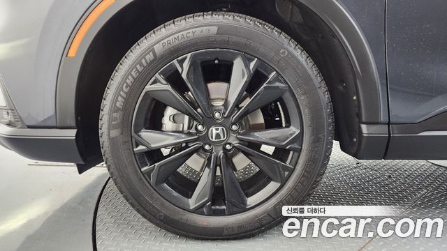Honda CR-V 6-го поколения 2.0 Hybrid Touring 2WD - фото 4