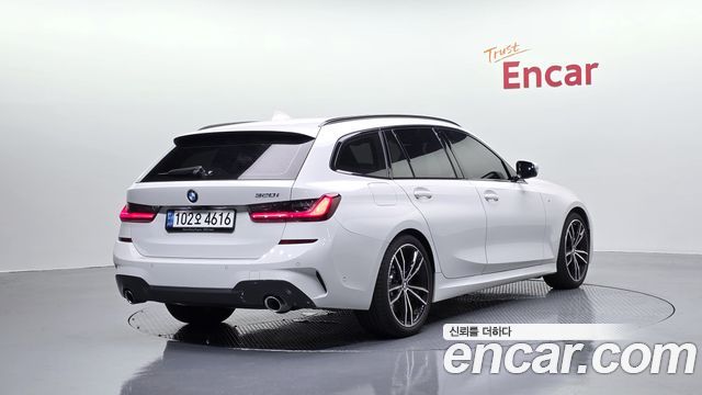 BMW 3-Series G20 320i Touring M Sports - фото 1