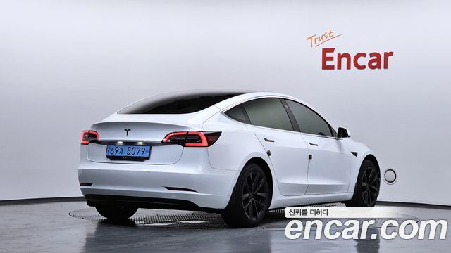 Tesla Model 3 Standard Range Plue RWD - фото 1