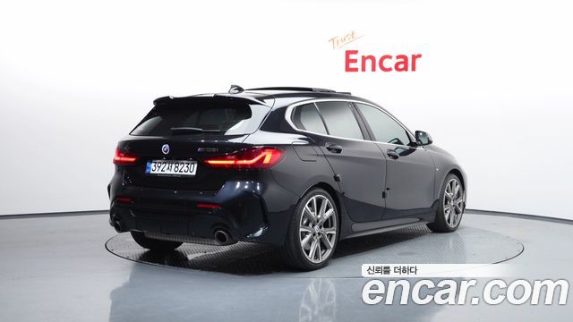 BMW 1-Series F40 M135i xDrive - фото 1