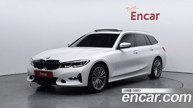 BMW 3-Series G20 320i Touring Luxury - фото 0