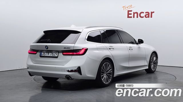 BMW 3-Series G20 320i Touring Luxury - фото 1