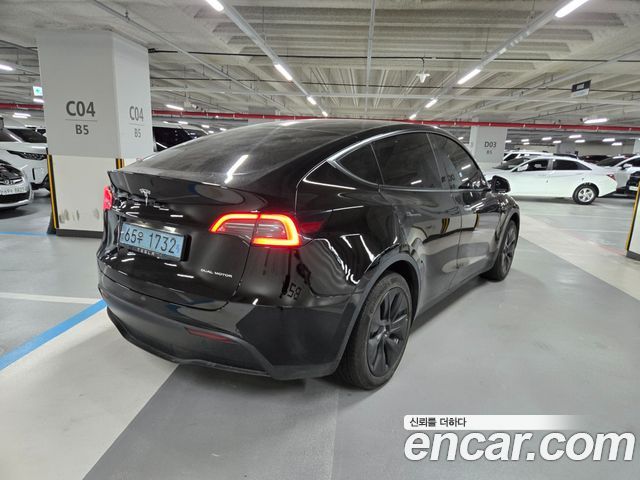 Tesla Model Y Long Range AWD - фото 1