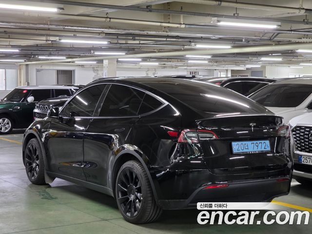 Tesla Model Y Long Range AWD - фото 2