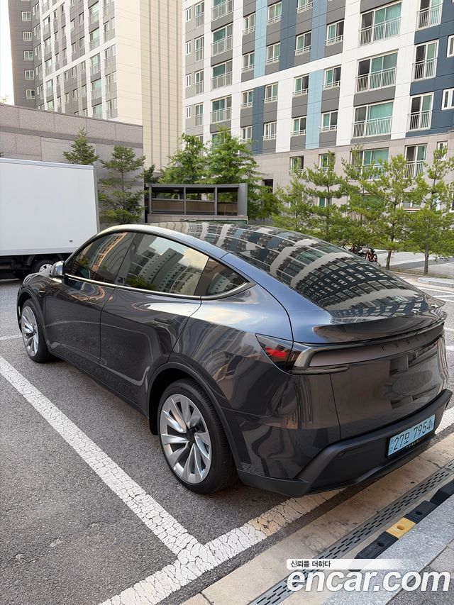 Tesla Model Y Long Range AWD - фото 1