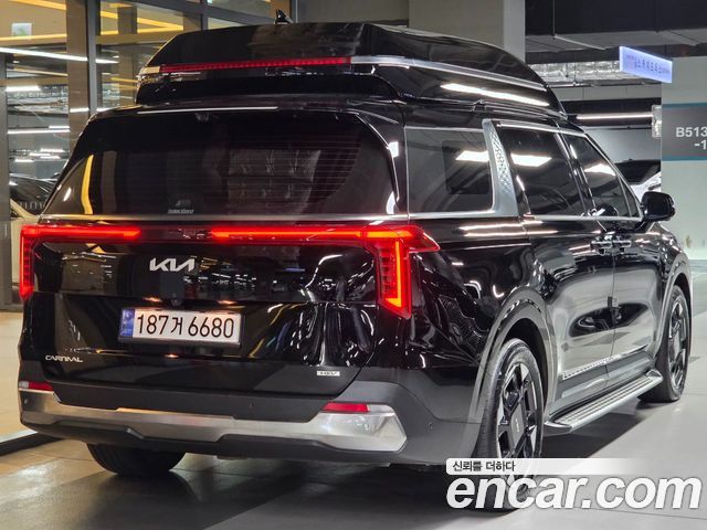 Kia Carnival Новый 4-го поколения HEV 9-Seater Hi-Limousine Signature - фото 1